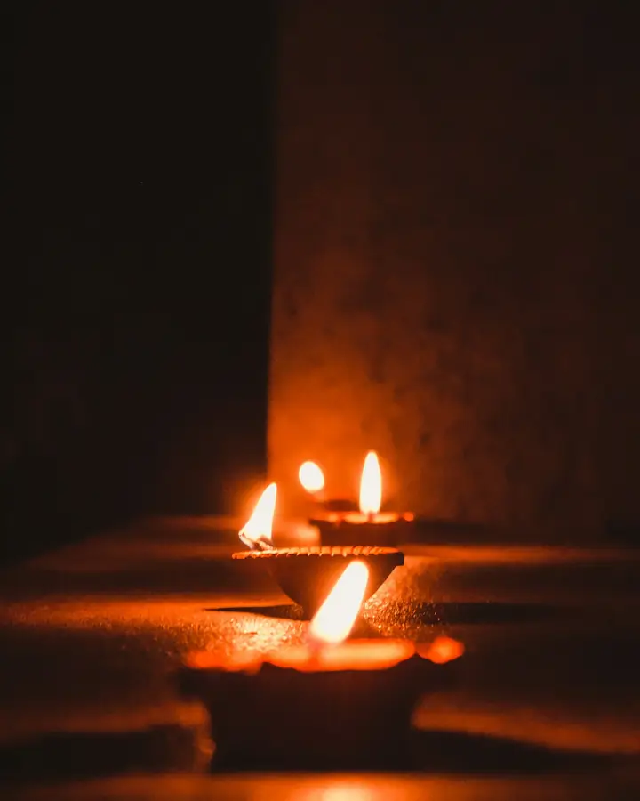 A lit clay diya
