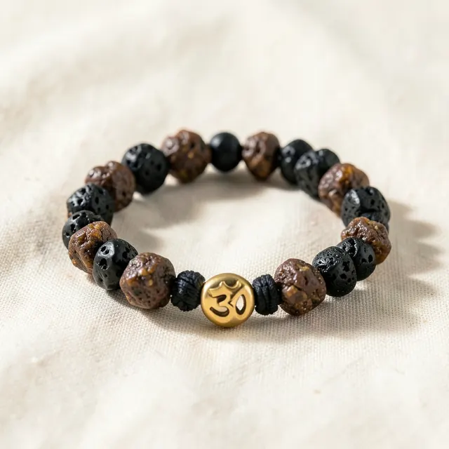 Om bracelet with raw pyrite and lava beads